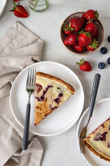 French quiche with strawberries. Traditional French pie. Open berries pie. Seasonal berries