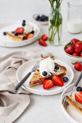French quiche with strawberries. Traditional French pie. Open berries pie. Seasonal berries