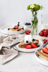 French quiche with strawberries. Traditional French pie. Open berries pie. Seasonal berries