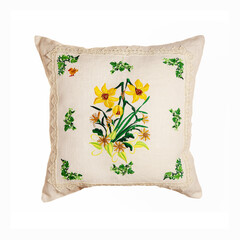 Embroidery in the form of flowers on a white linen pillow. 