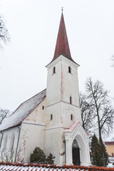 Fototapeta na wymiar Lauciene lutheran church in winter day, Latvia.