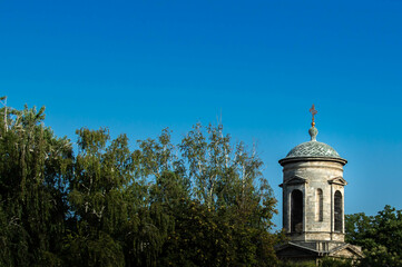 
the chapel tower on the blue sky.