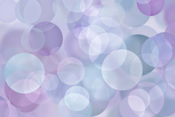 Beautiful purple background with many blurry white lights similar to bokeh