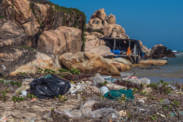 Real Sea ocean life climate crisis, nature land pollution. Dirty beauty rocky beach, throwing...