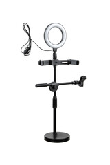 Closeup of circular neon LED lamp isolated white background. Popular modern light for make-up and beauty portraits.