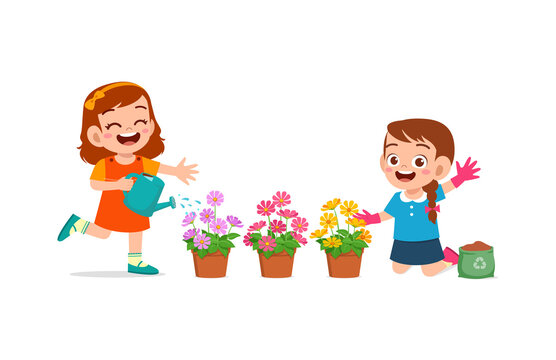 cute little girl stand and watering flower