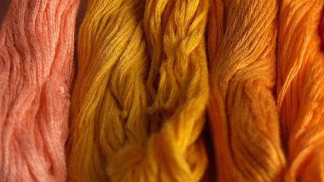 A top view of colorful mouline threads isolated on a white background.