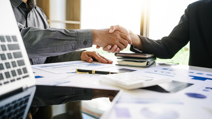 handshake gestures people connect concept, Business negotiation, happy business woman shaking hands at work, enjoying with colleagues.