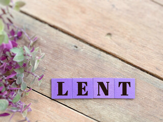 Lent Season,Holy Week and Good Friday concepts - word lent on purple wooden blocks in vintage...