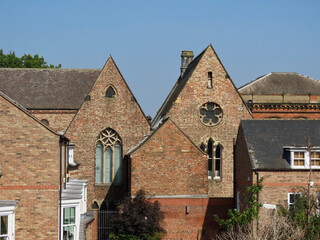 Fototapeta na wymiar York Baptist church and traditional English red brick houses as seen from city wall