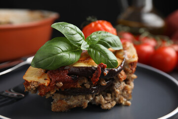 Grey plate of delicious eggplant lasagna, closeup