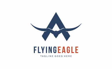 Obraz premium letter A logo design with flying eagle silhouette 