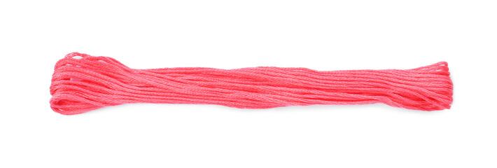 Bright pink embroidery thread on white background