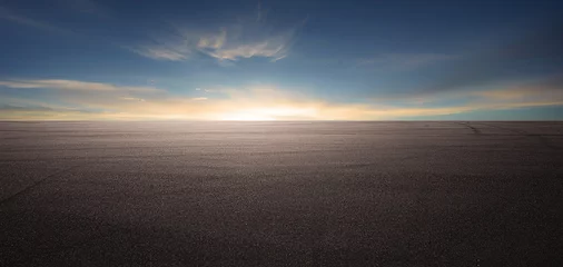 Fototapete Panorama empty asphalt road and tarmac floor. Sunrise scene. © Image Craft