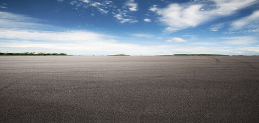 Fototapeta Panorama empty asphalt road and tarmac floor. Cloudy sky obraz
