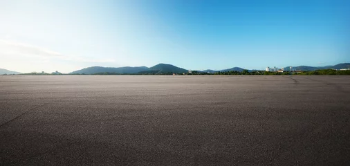 Foto op Canvas Panorama empty asphalt road and tarmac floor with moutain on back © Image Craft