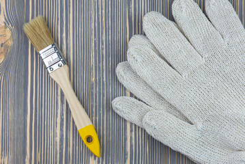 Paint brush and work gloves.
