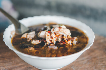Hot and sour meat soup (Tom Yum) pork or chicken
