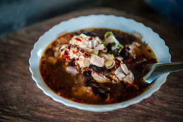 Hot and sour meat soup (Tom Yum) pork or chicken