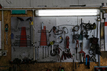 Car tools on the wall. Auto mechanic garage with workshop tools wall. Repair concept.