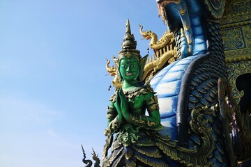 Wat Rong Suai Ten, a famous tourist destination in Chiang Mai, Thailand. Closeup green Buddha statue