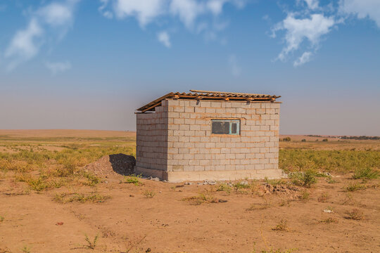 Temporary shelter cinder block shed