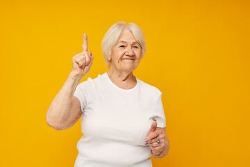 Photo of retired old lady posing face grimace joy isolated background