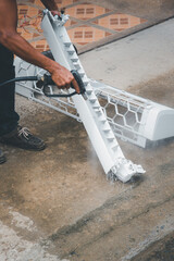 Cleaning air conditioner by water for clean a dust