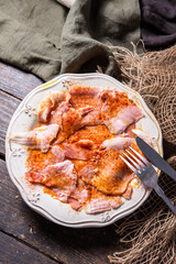 Typical Spanish tapa, Galician lacón, cut pork, with potatoes, paprika and olive oil. Appetizer, lunch or dinner.