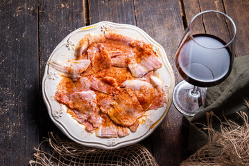 Typical Spanish tapa, Galician lacón, cut pork, with potatoes, paprika and olive oil. Appetizer, lunch or dinner.