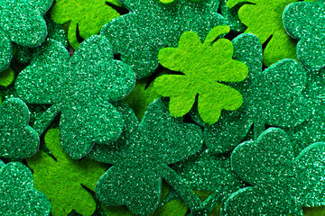 Handmade clover leaves flat lay background