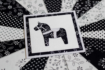 Handmade greeting card with Swedish Dala or Daleclarian horse floral folk pattern in black and white.
