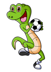 The happy lizard is holding the ball and playing the soccer