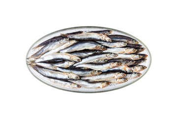 salted fish european anchovy on an oval glass plate  isolated on a white background close-up top view