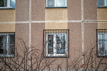 Fragment of the facade of a residential apartment building on a winter day