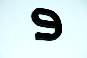 Shape of letter or number 9 on white background
