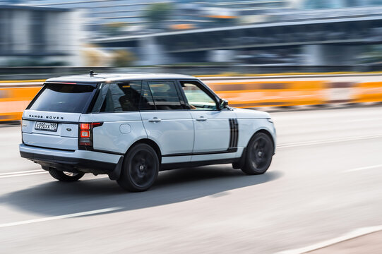 Range Rover L405 SUV in motion on the highway with blurred background