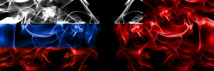 Russia, Russian vs Abu Dhabi, Emirate flags. Smoke flag placed side by side isolated on black background