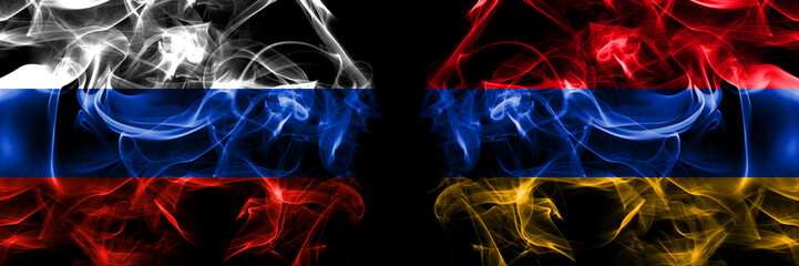 Russia, Russian vs Armenia, Armenian flags. Smoke flag placed side by side isolated on black background