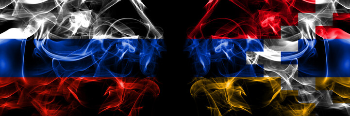 Russia, Russian vs Artsakh, Artsakhtsi, Nagorno Karabakh flags. Smoke flag placed side by side isolated on black background