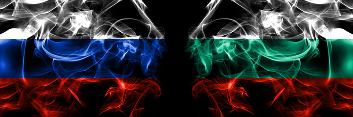 Russia, Russian vs Bulgaria, Bulgarian flags. Smoke flag placed side by side isolated on black background