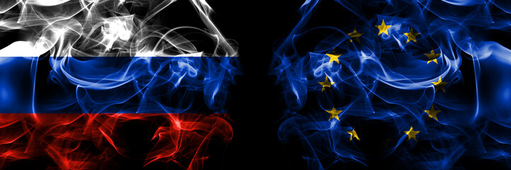 Russia, Russian vs Europe, European, European Union flags. Smoke flag placed side by side isolated on black background