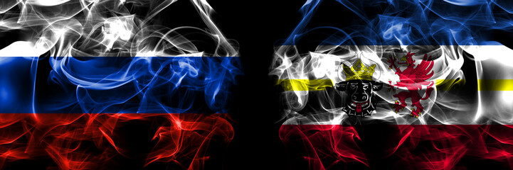 Russia, Russian vs Germany, Mecklenburg Western Pomerania, state flags. Smoke flag placed side by side isolated on black background