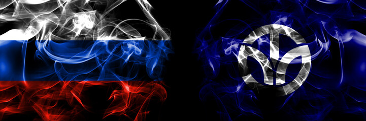 Russia, Russian vs Japan, Japanese, Fukui Prefecture flags. Smoke flag placed side by side isolated on black background