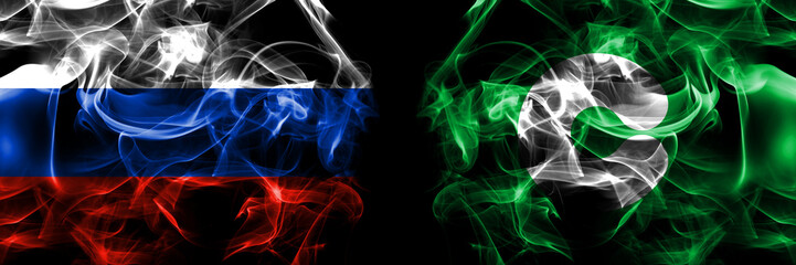Russia, Russian vs Japan, Japanese, Kumamoto flags. Smoke flag placed side by side isolated on black background