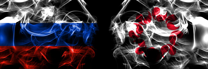 Russia, Russian vs Japan, Japanese, Saitama Prefecture flags. Smoke flag placed side by side isolated on black background