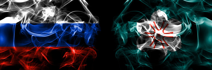Russia, Russian vs Japan, Japanese, Saga Prefecture flags. Smoke flag placed side by side isolated on black background