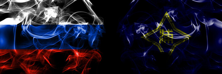 Russia, Russian vs Japan, Japanese, Urahoro, Hokkaido, Tokachi, Subprefecture flags. Smoke flag placed side by side isolated on black background