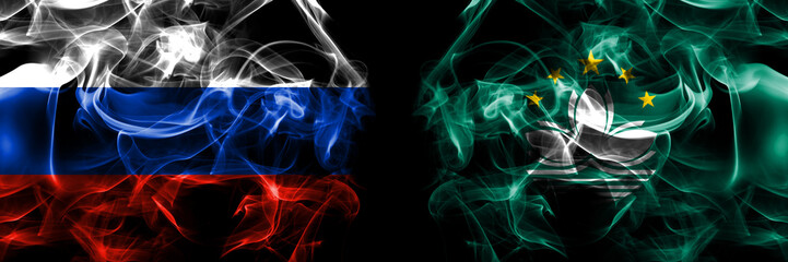 Russia, Russian vs Macau, China, Chinese flags. Smoke flag placed side by side isolated on black background