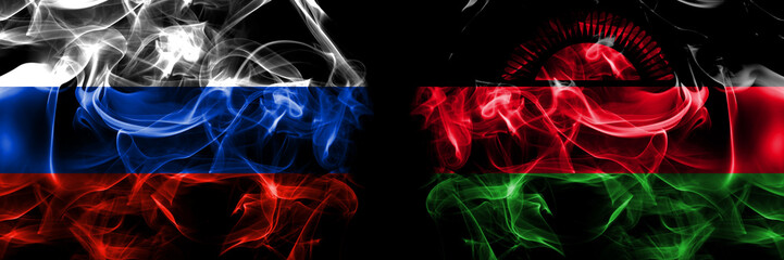 Russia, Russian vs Malawi flags. Smoke flag placed side by side isolated on black background
